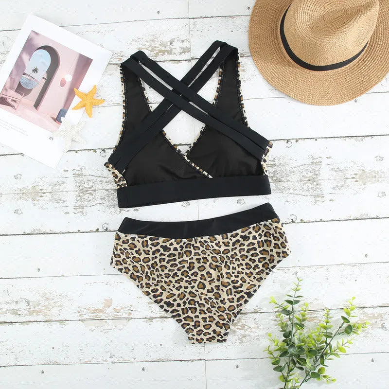 Leopard print women's bikini swimsuit with V-neck criss-cross band top and high-leg briefs.