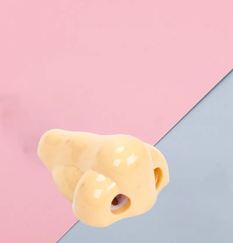 Geometry plastic pencil sharpener with big nostril opening in flesh colour measuring 58x45x30mm