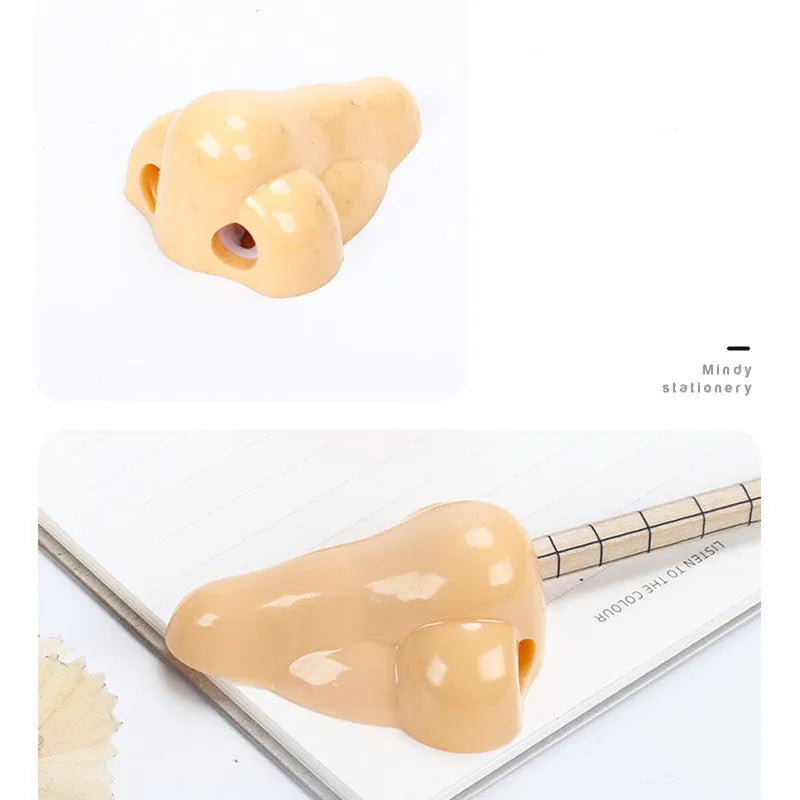 Geometry plastic pencil sharpener with big nostril opening in flesh colour measuring 58x45x30mm