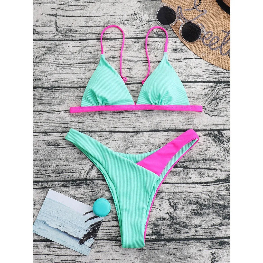 Women's two-piece swimsuit bikini briefs in a pattern print design made from nylon fabric.