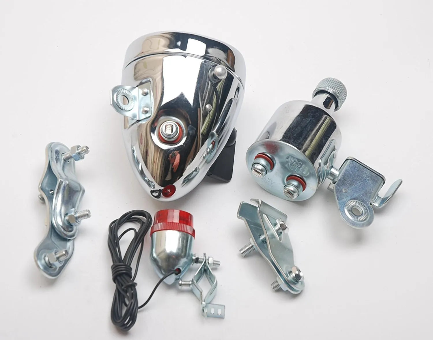 Silver bicycle dynamo-powered generator light kit for front fork or rear frame mounting.