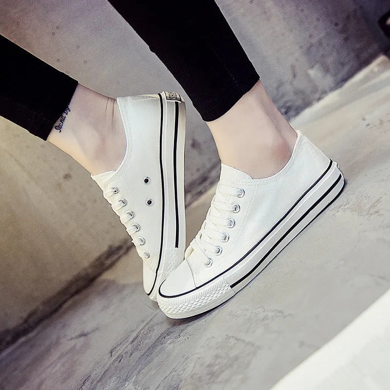 Women's solid colour canvas casual shoes in black, white black, white red, and all black colourways