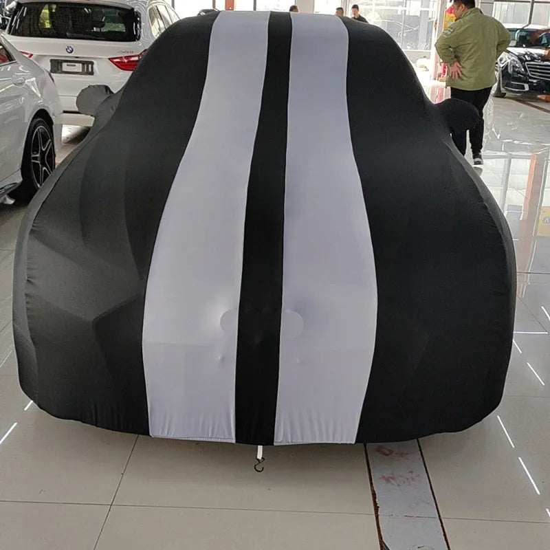 Ford Mustang car cover in elastic fabric shown in a choice of black, red, blue, grey, yellow, or orange.