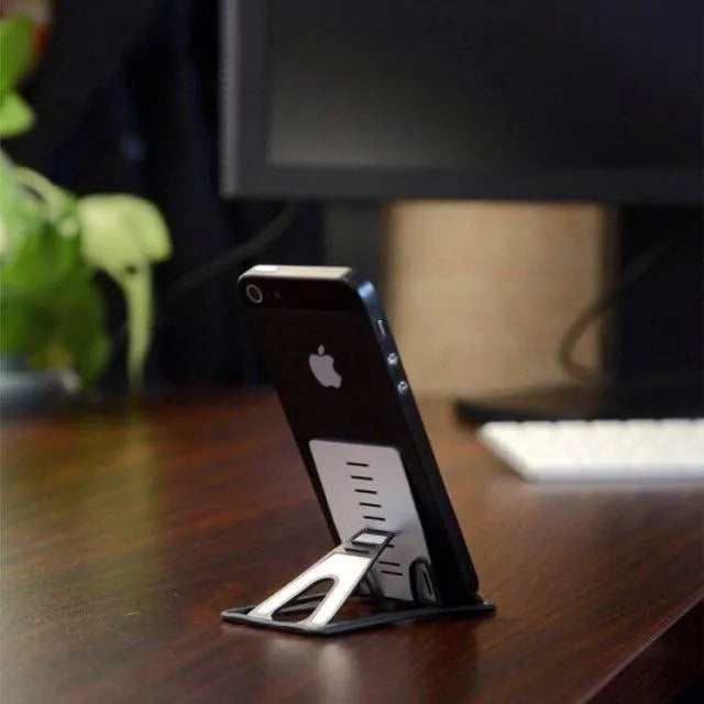 Black minimalist card phone holder for desk, measuring 8.5cm wide by 5cm deep.