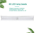 Slim rechargeable LED motion sensor light strip mounted inside a dark cupboard, illuminating the contents.