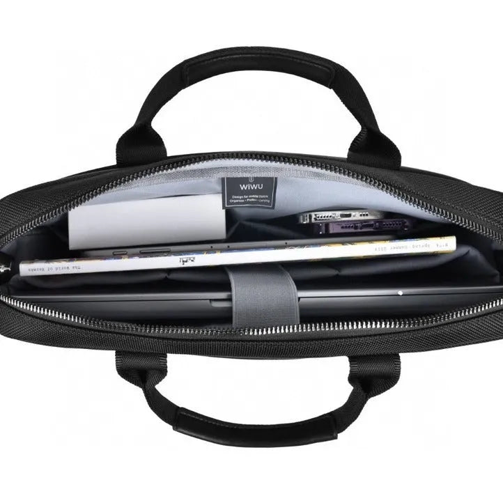 Black Oxford cloth multi-pocket laptop handbag open to show separate organiser layers and laptop compartment.