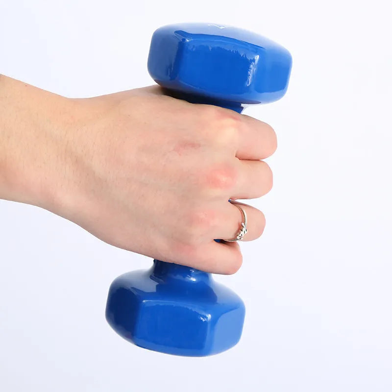 A set of bright red and blue plastic fitness dumbbells with a glossy, rubber-coated surface.