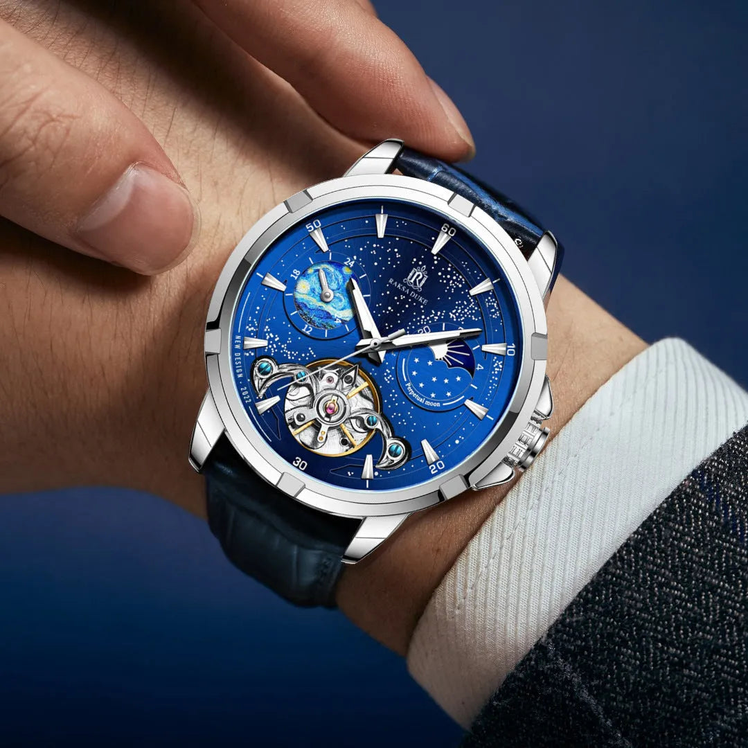 Men's blue automatic mechanical watch with leather strap on wrist, showing 42mm case.