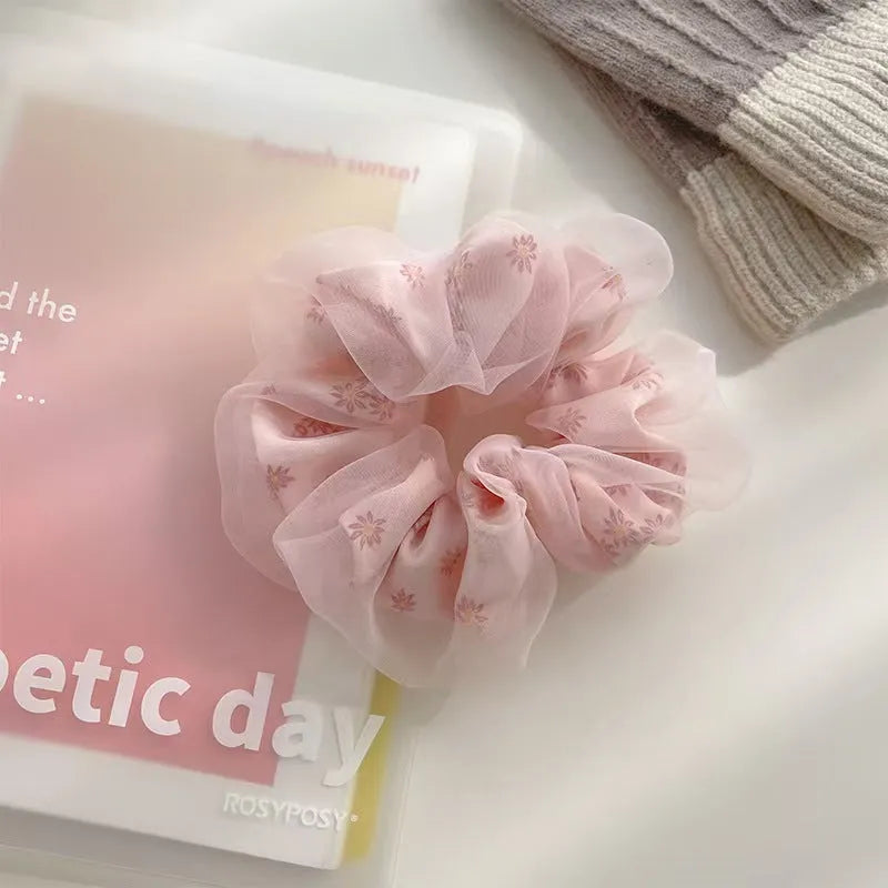 Mesh Sense bun large intestine hair band in milky white, made from soft cloth with a natural style, for women