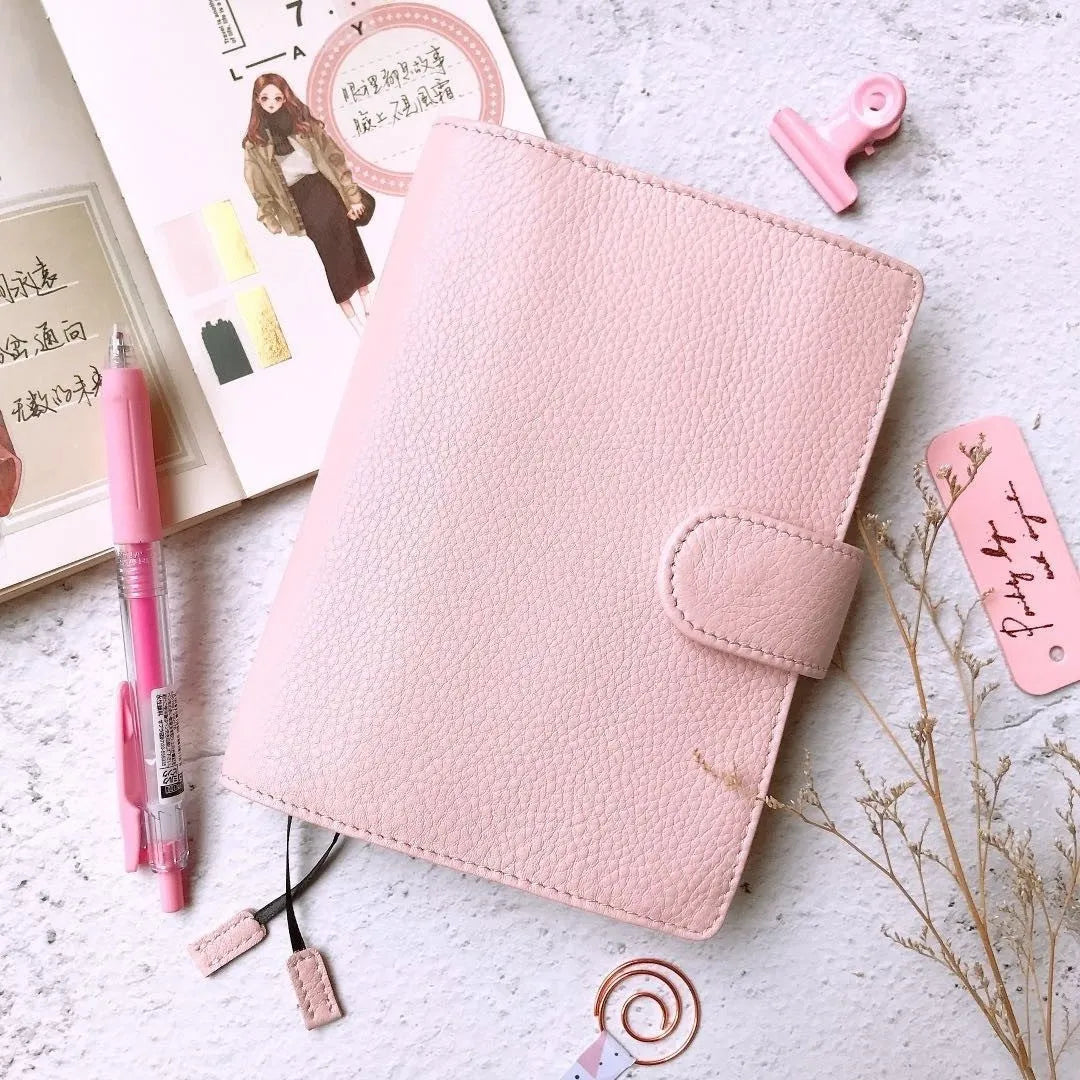 Lychee pattern cowhide leather notebook in A6 size with loose-leaf binding