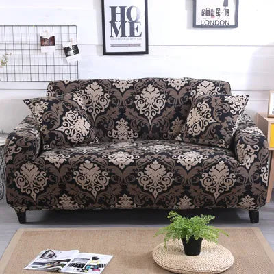 Geometric pattern stretch sofa slipcover and matching cushion cover on a double seat sofa.