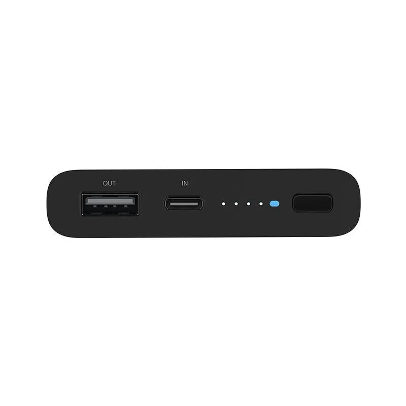 White 10000mAh power bank showing USB Type-C port, USB output, and wireless charging symbol.