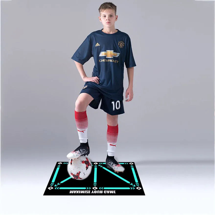 Black football training mat with non-slip rubber base measuring 60cm by 90cm