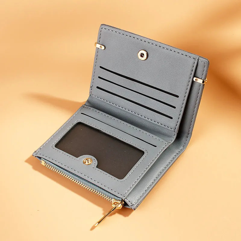 Ladies wallet in PU leather with multiple card slots, zipper closure, and two-fold design shown in various colours.