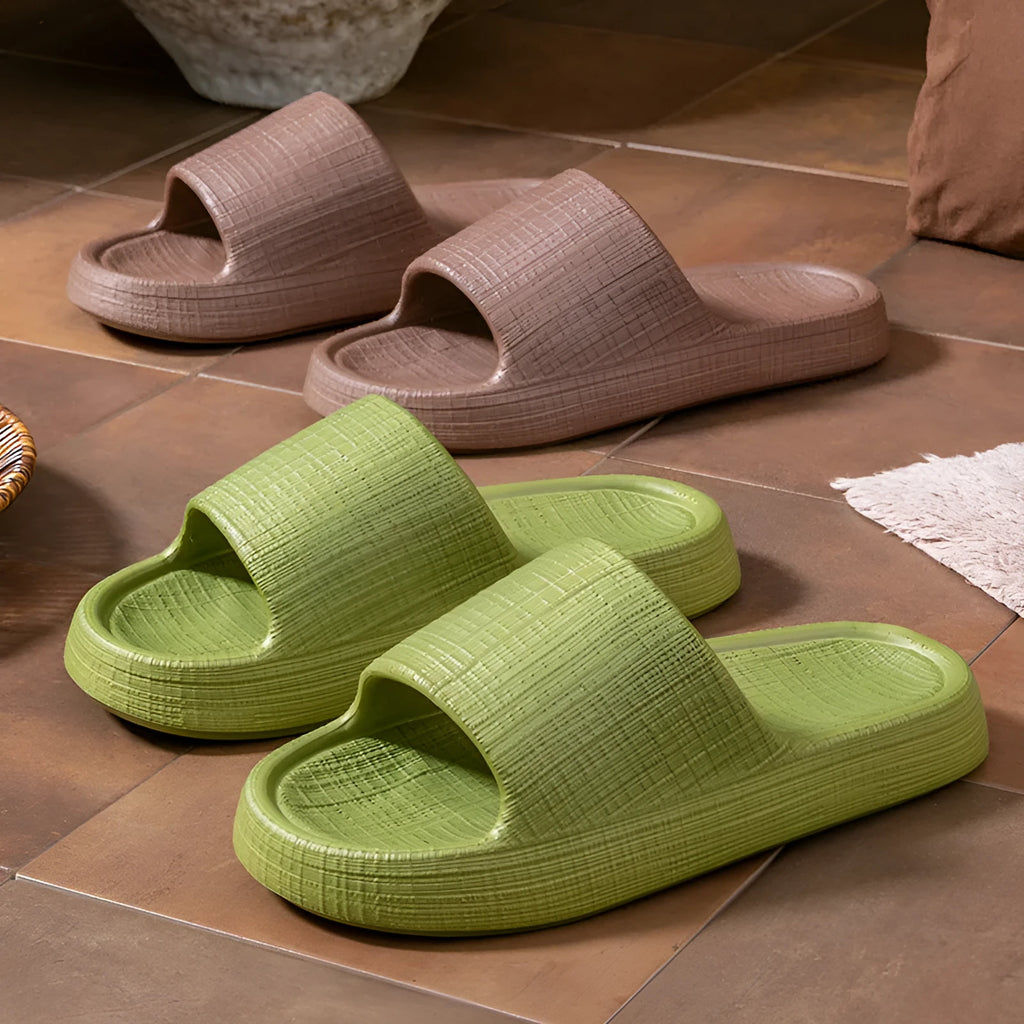 A pair of EVA toe ring slippers in a chosen colour, showing the soft non-slip sole and strap design.