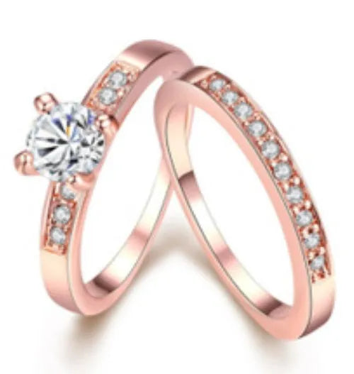 Rose gold ring with diamonds on copper base, available in sizes 5 to 12, shown on a neutral background