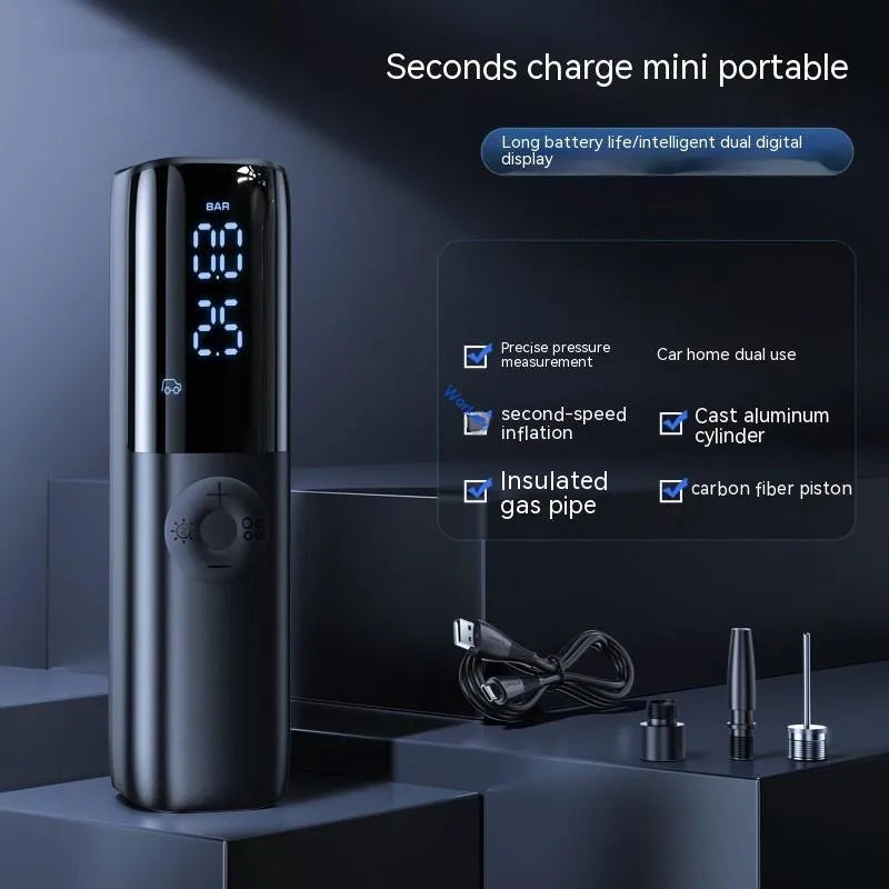 Black portable electric car air pump with tyre pressure gauge and inflation hose.