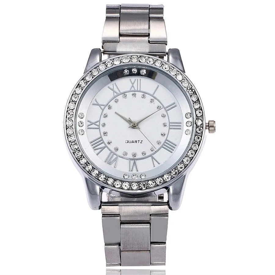 Vansvar women's rose gold quartz wristwatch with round stainless steel case and glass dial