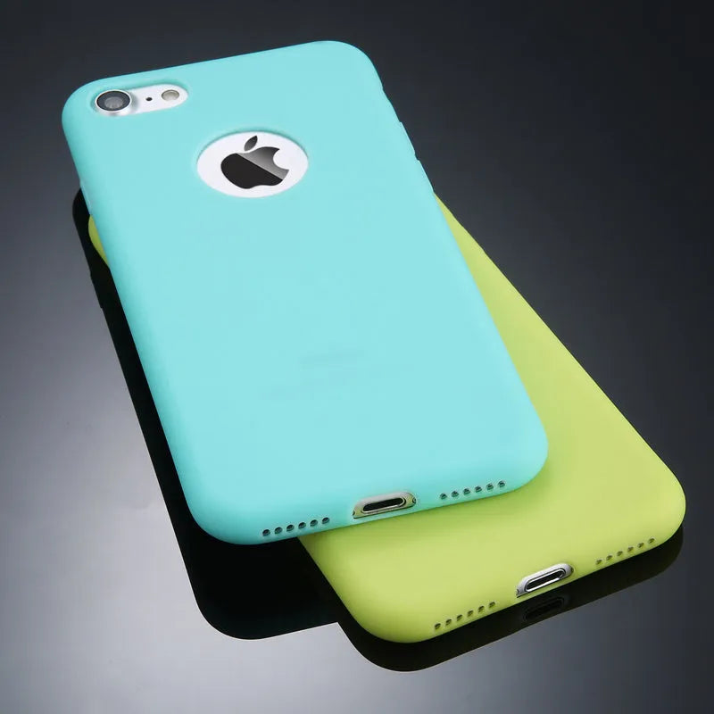 USLION soft silicon candy colour phone case for iPhone X XR 7 6 5 models on a table.