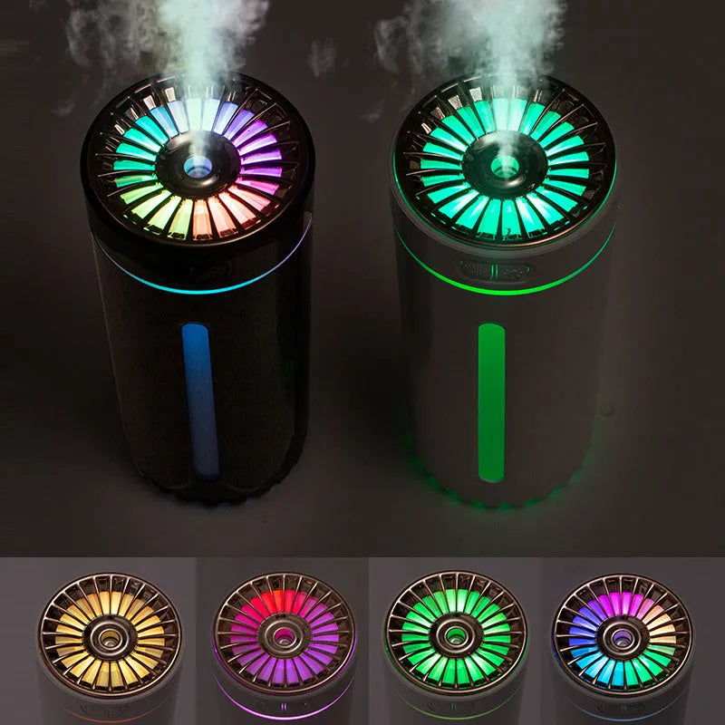Black portable USB rechargeable humidifier with colourful LED lights on a car cup holder