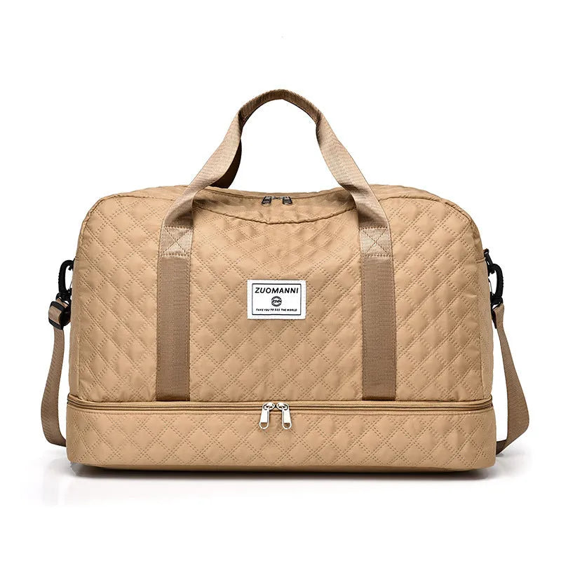 Large Oxford cloth travel holdall in a solid colour, shown with a capacity of 36-55 litres for buggies and luggage.