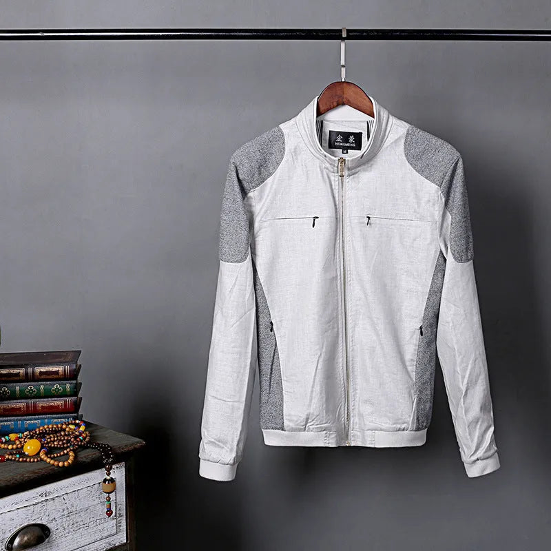 Men's thin colour block linen jacket in blue, grass green, or heather grey on a hanger.