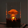 Small resin night lamp shaped like an atomic bomb mushroom cloud explosion in two colour variants.