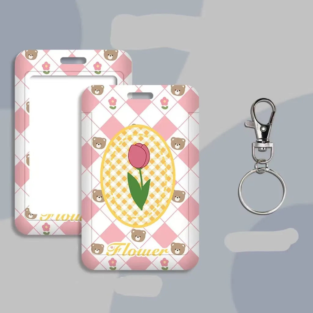 Cartoon-style plastic ID card sleeve and lanyard set with keychain, shown in Bear Rose design.