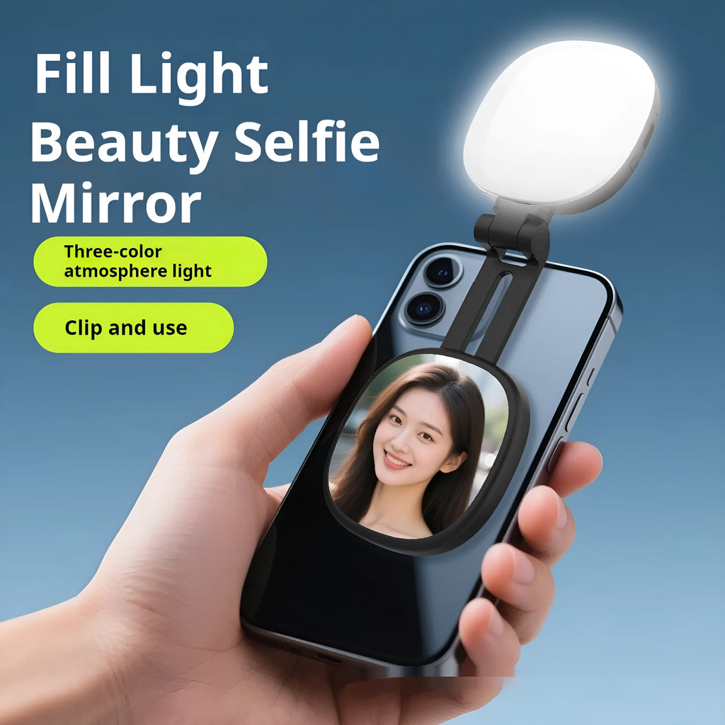 Black and white mini portable fill light with magnetic phone holder, showing three colour temperature buttons and a dimming slider.
