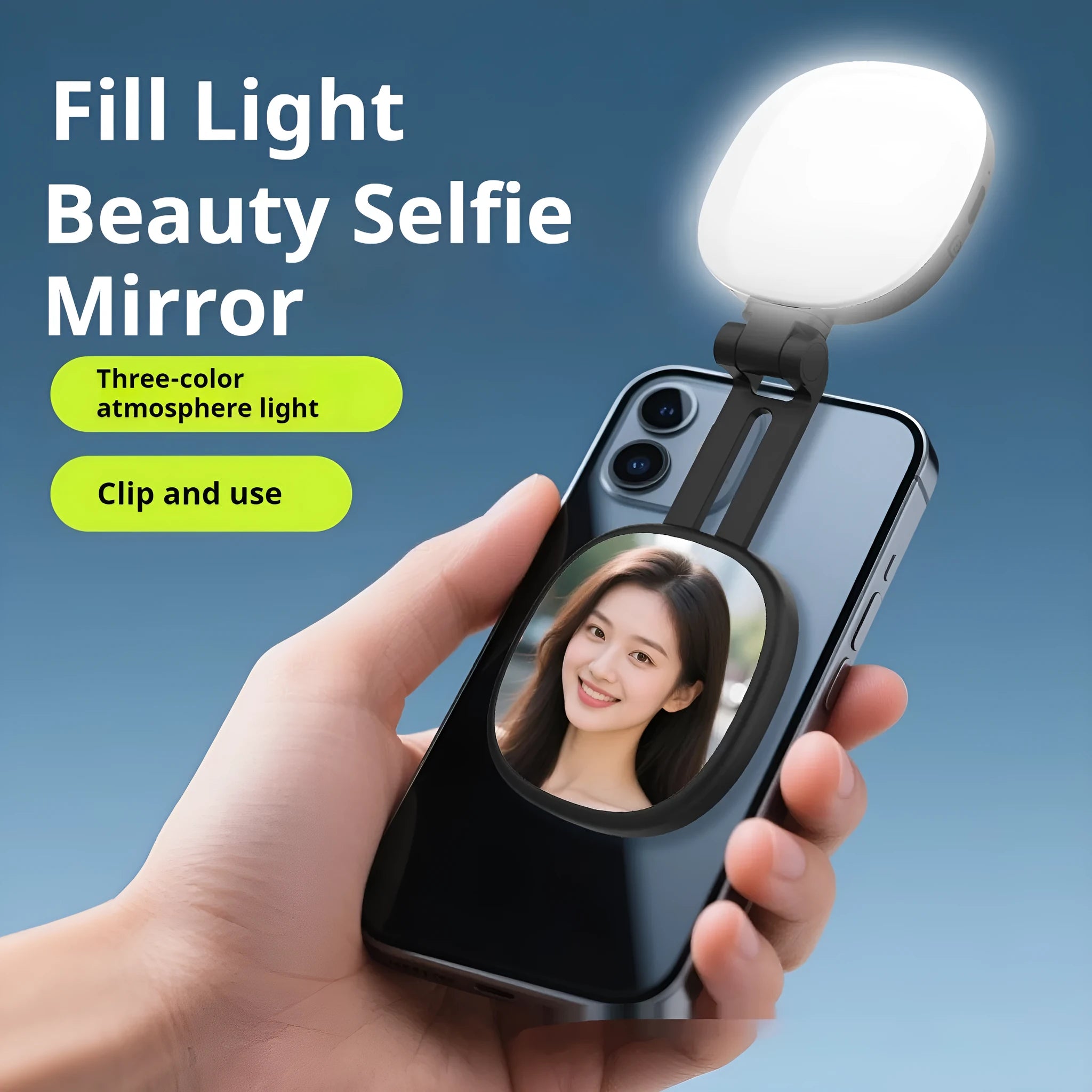 Black and white mini portable fill light with magnetic phone holder, showing three colour temperature buttons and a dimming slider.