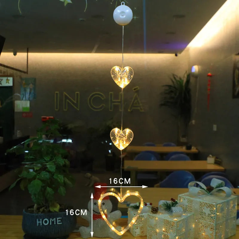 Christmas window lights with star-shaped LED pendants and suction cups for battery-operated festive decoration