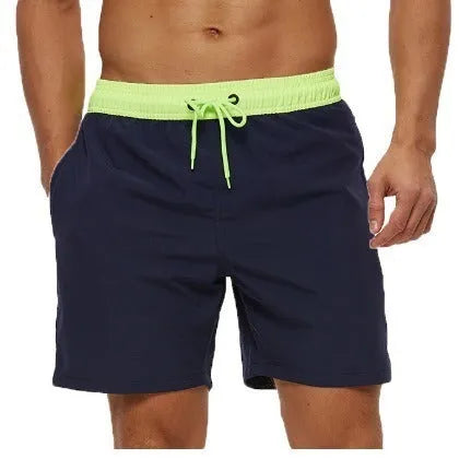 Men's blue running shorts with a stitching waistband, drawstring, and zipper pocket.