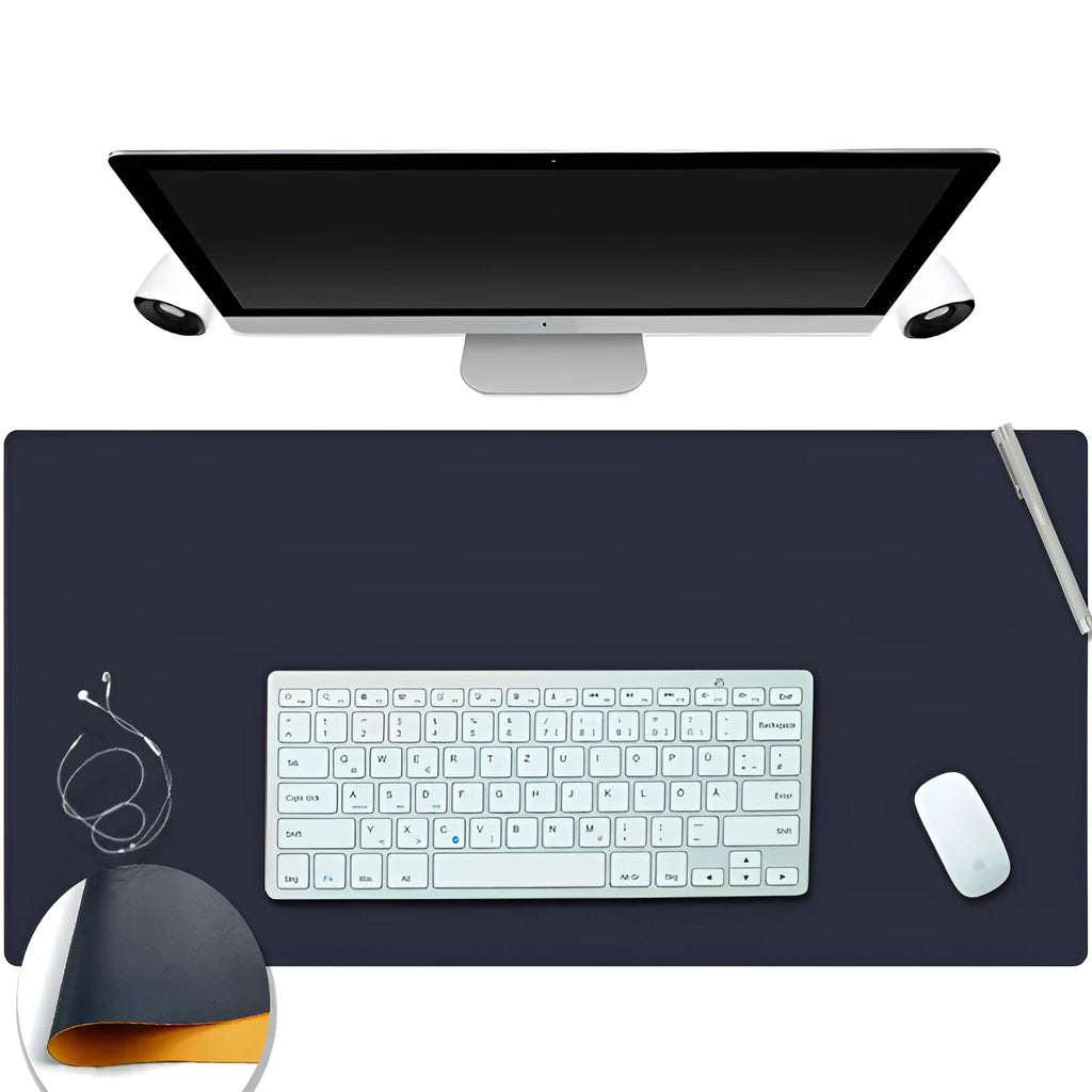 Leather desk mat in multiple sizes and colours for office or study use, shown on a desk with a computer mouse.