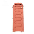 Ochre and olive green portable cotton camping sleeping bag quilt laid flat.