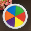 Children's finger print mud kit with plastic inkpad, stamp, and picture album for non-toxic sensory play.
