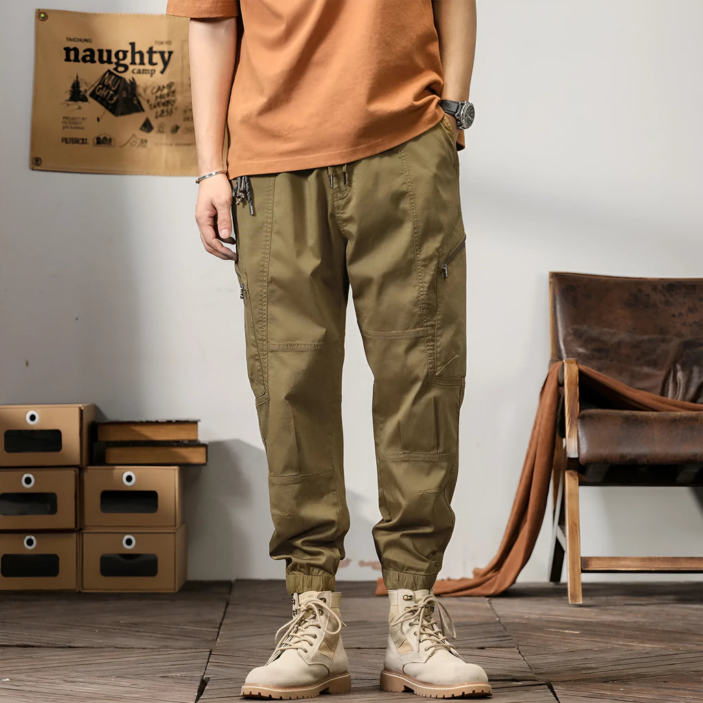 Men's tapered harem trousers in cotton with banded ankle and elastic waist in solid colour options.