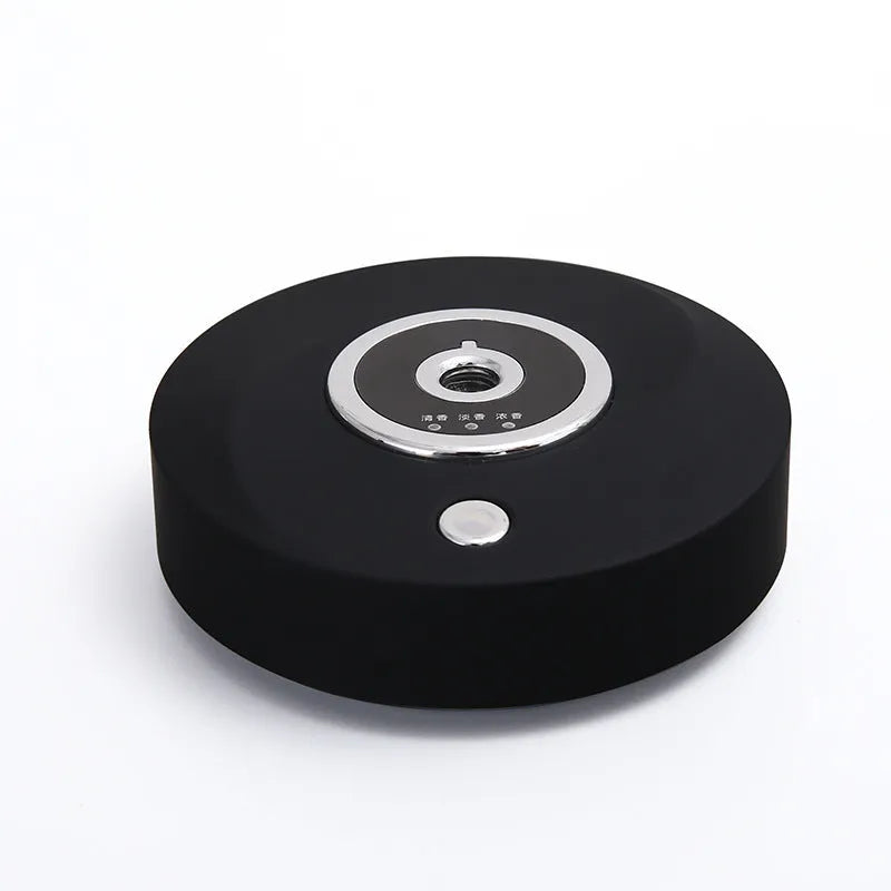 USB-powered car air freshener spray unit in black, grey or white with charging cable and anti-slip pad
