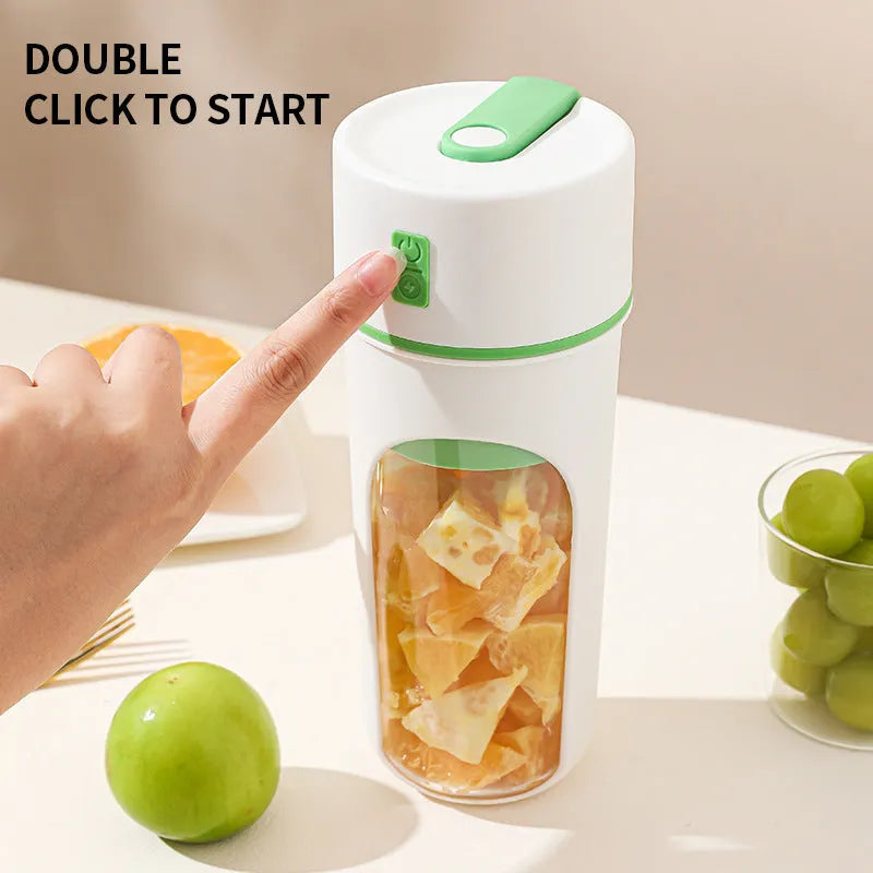 Blue portable USB electric juicer blender with 400ml clear plastic cup on a table