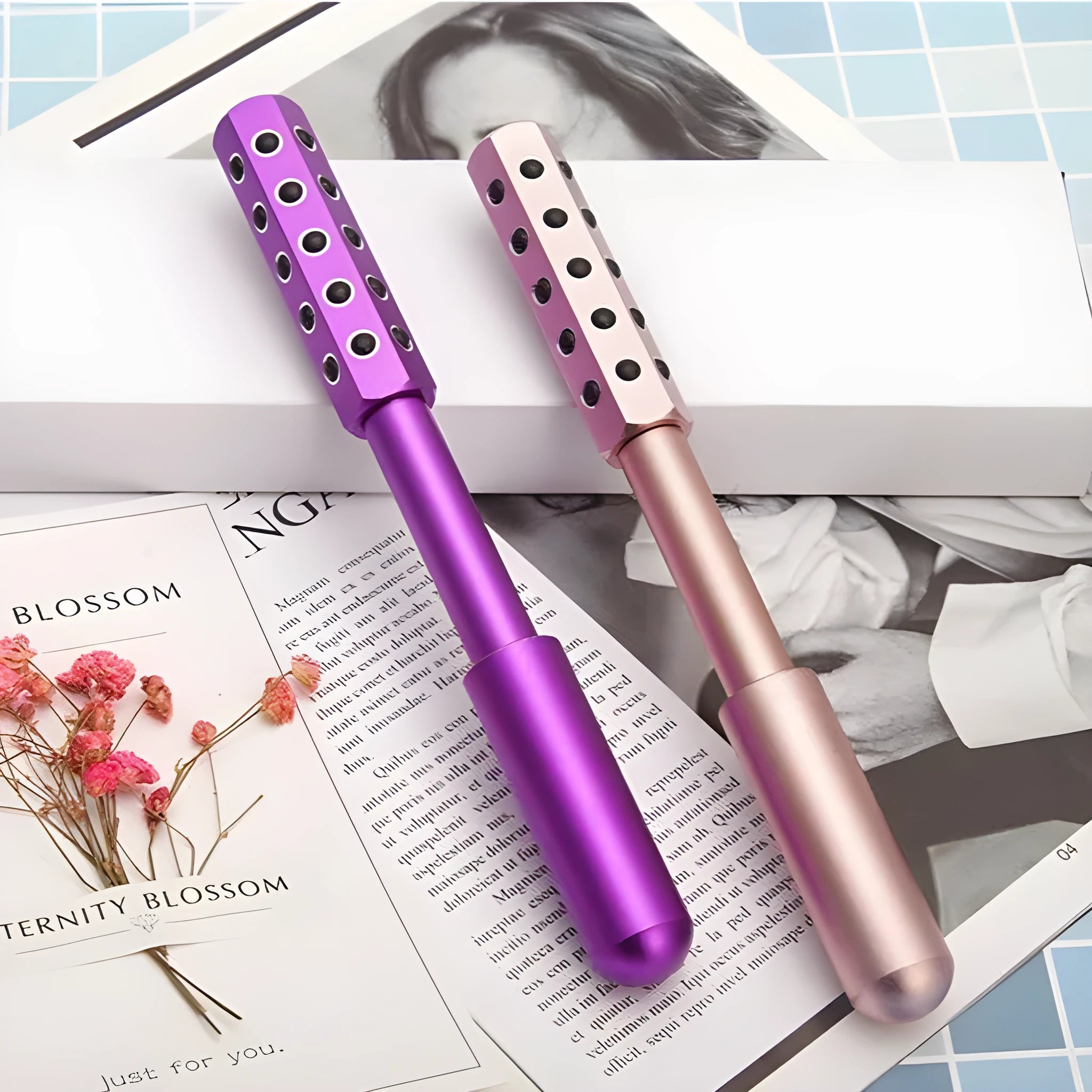 Purple beauty massage roller with germanium particles, 193 mm long, for facial and eye contouring.