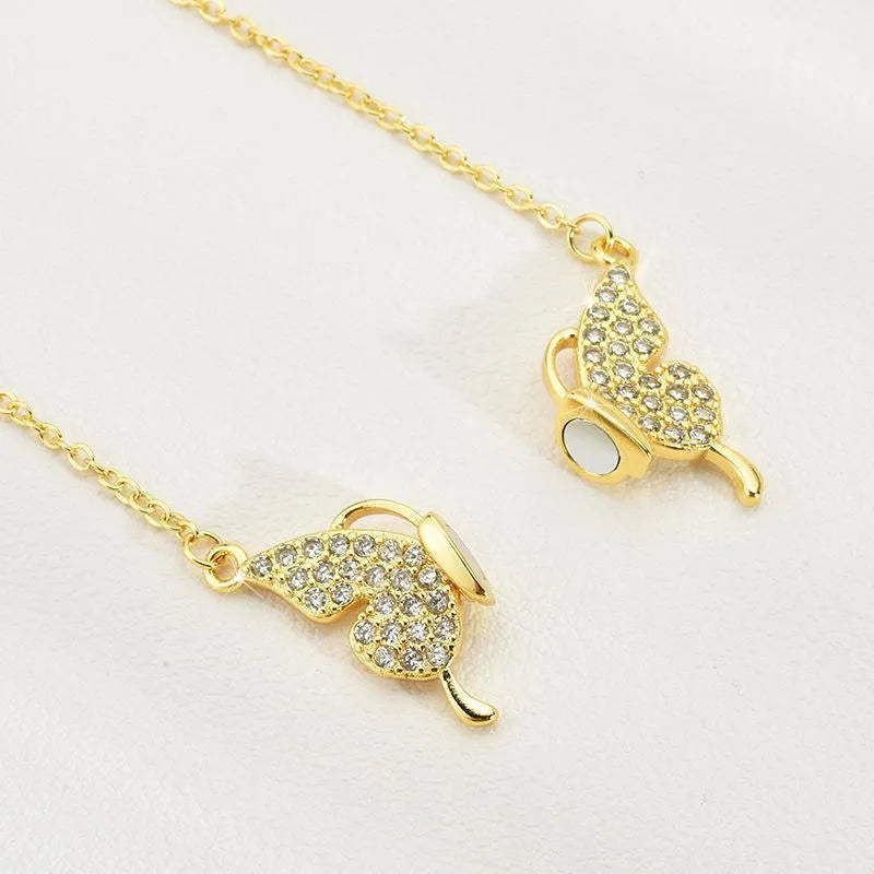 Gold and silver magnetic clasp butterfly necklace on twisted titanium steel chain