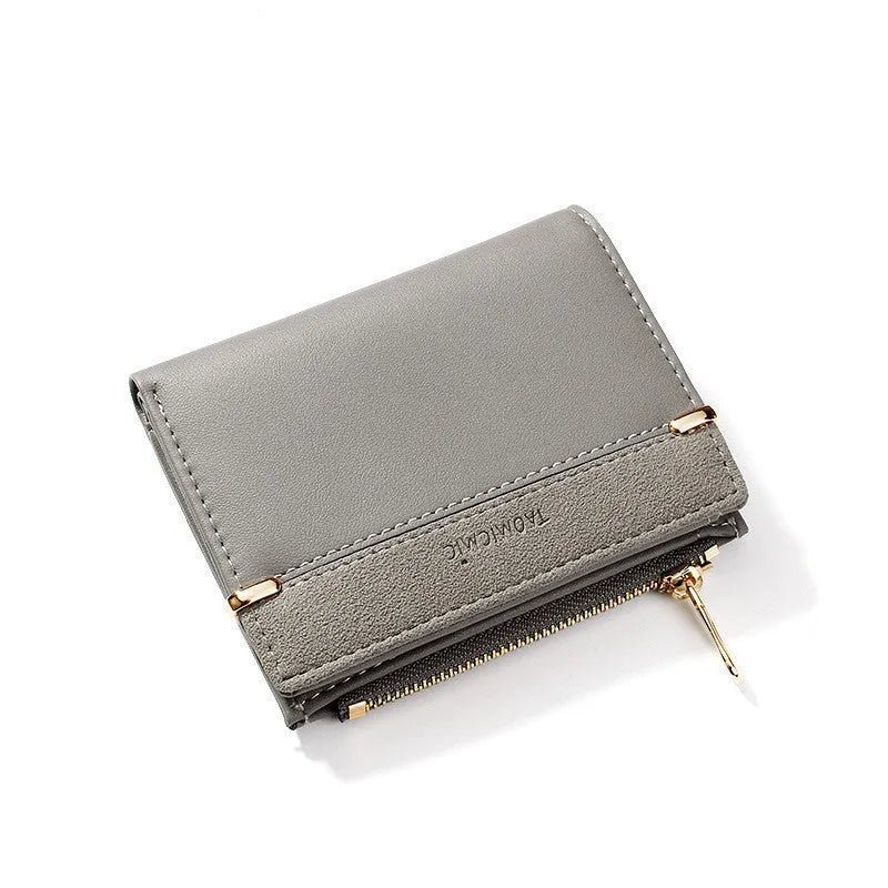 Ladies wallet in PU leather with multiple card slots, zipper closure, and two-fold design shown in various colours.