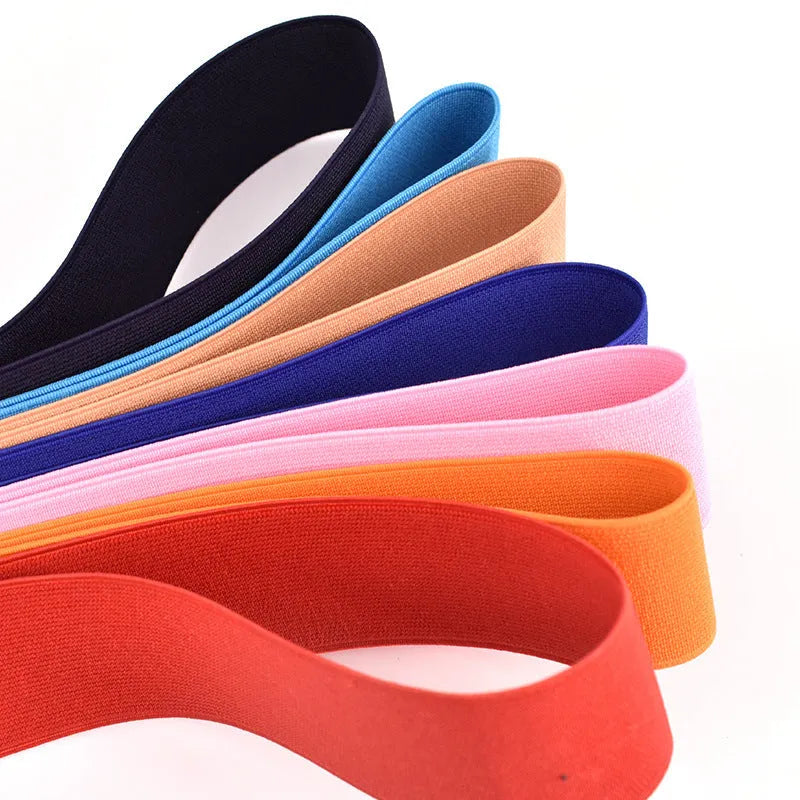 5cm wide colourful elastic band showing ten colour options including black, brown, dark red and blue variants