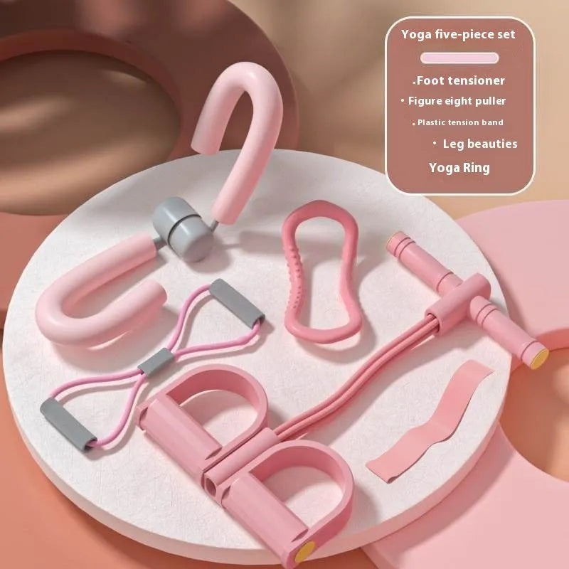 Yoga four piece set showing leg stretcher, yoga ring, pedal chest expander and figure eight tension rope.