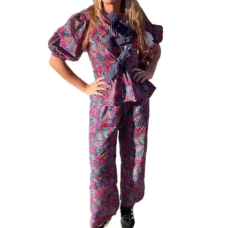 Women's floral printed polyester trousers suit with puff sleeves and tie-neck detail