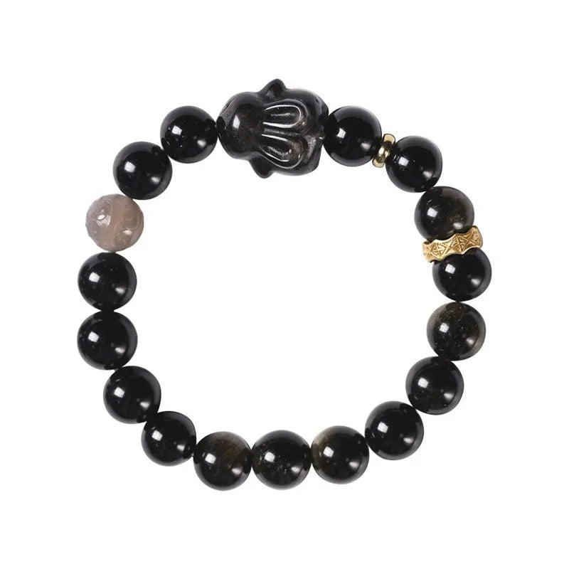 Handmade obsidian bracelet with lying rabbit charm, grey agate beads and brass metalwork in national style