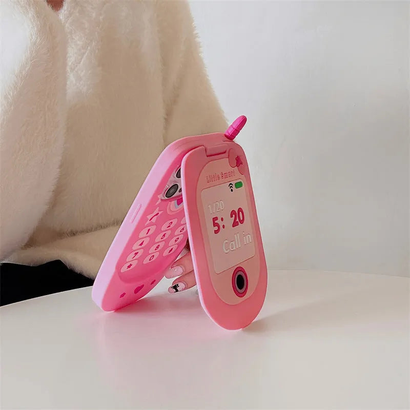 Light pink silicone flip phone case with a built-in mirror, shown next to a rose red version.