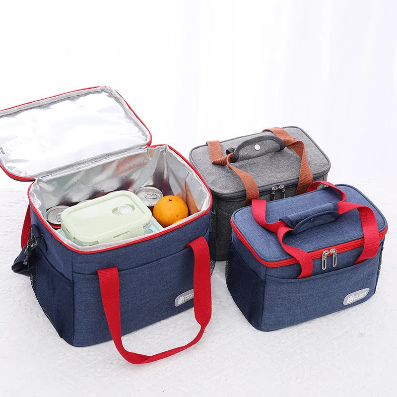 Insulated crossbody picnic bag with shoulder strap in grey colour showing 15 litre capacity