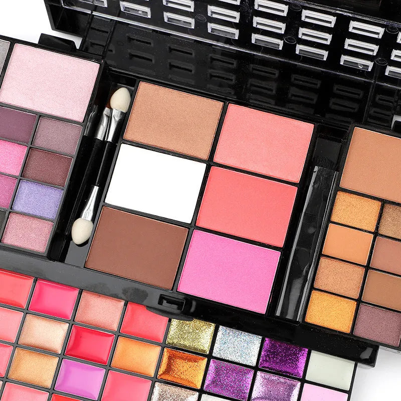 74 colour makeup palette set with four layers, mirror and brushes including eyeshadows and lip glosses