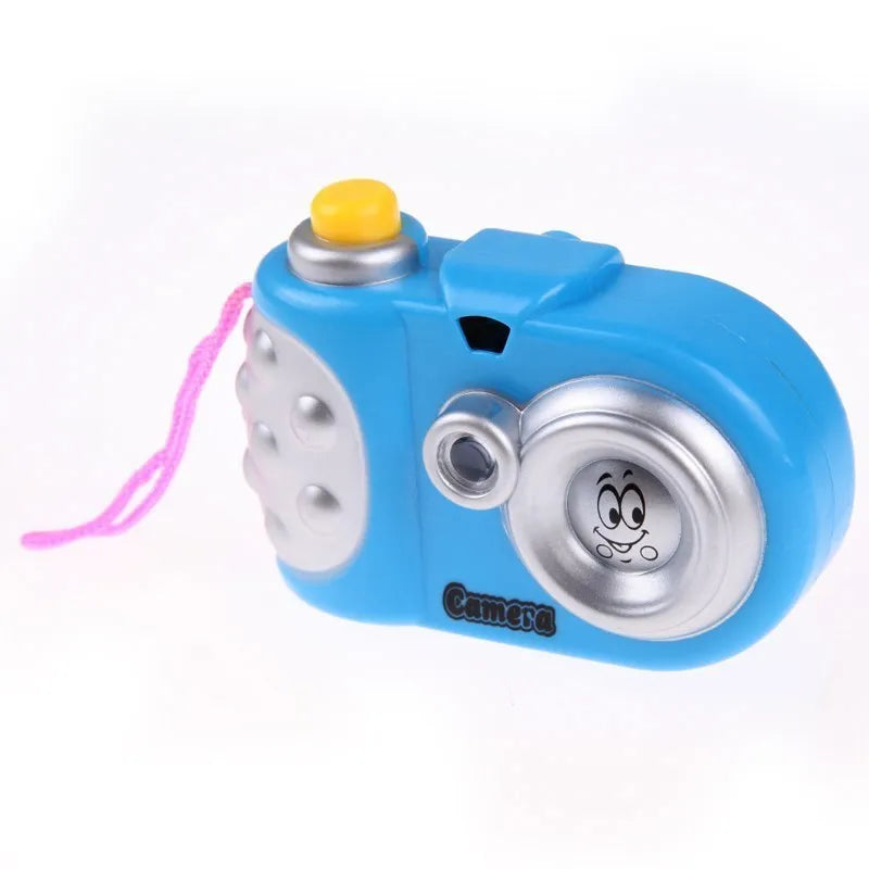 Children's plastic projection camera toy showing animal images including dinosaurs and dolphins
