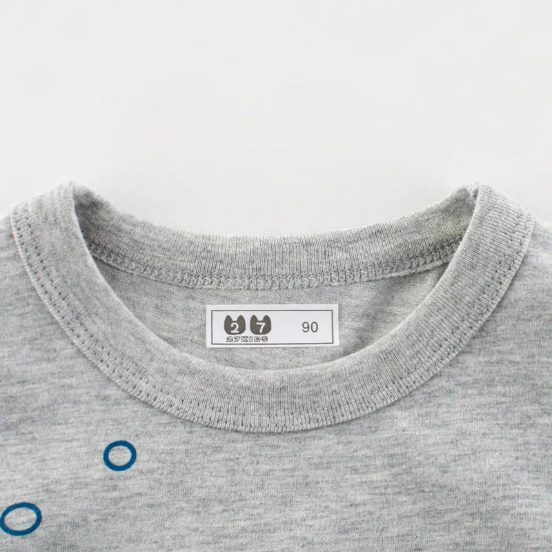 Grey children's cotton T-shirt shown with a size chart listing measurements from 90cm to 140cm.